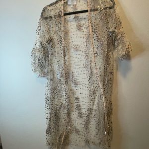 Sheer glitter kimono worn for a photoshoot